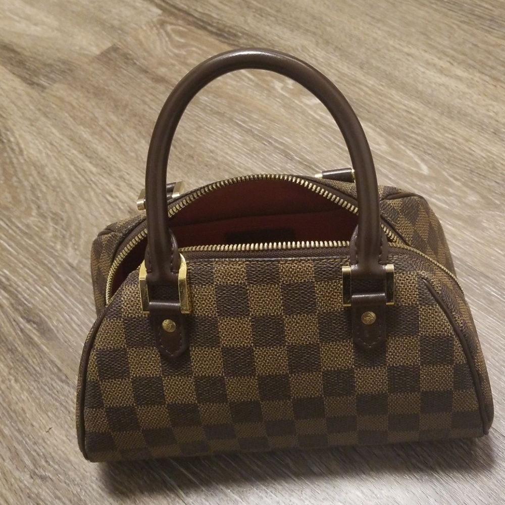 Louis Vuitton Mini bag. Excellent condition.